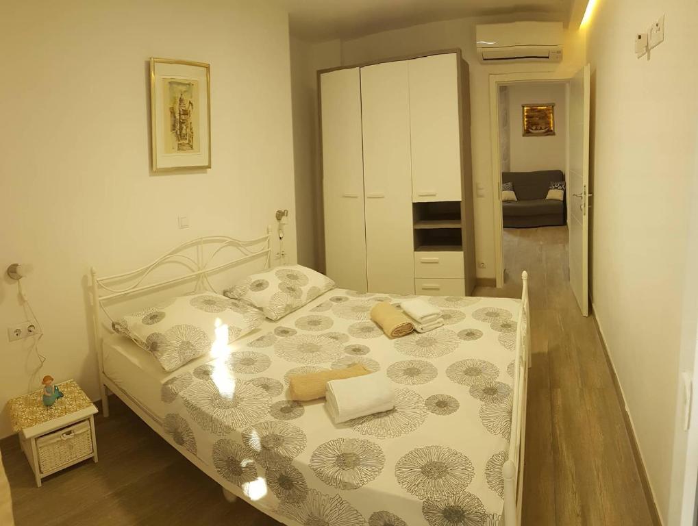 Posteľ alebo postele v izbe v ubytovaní Niko apartment