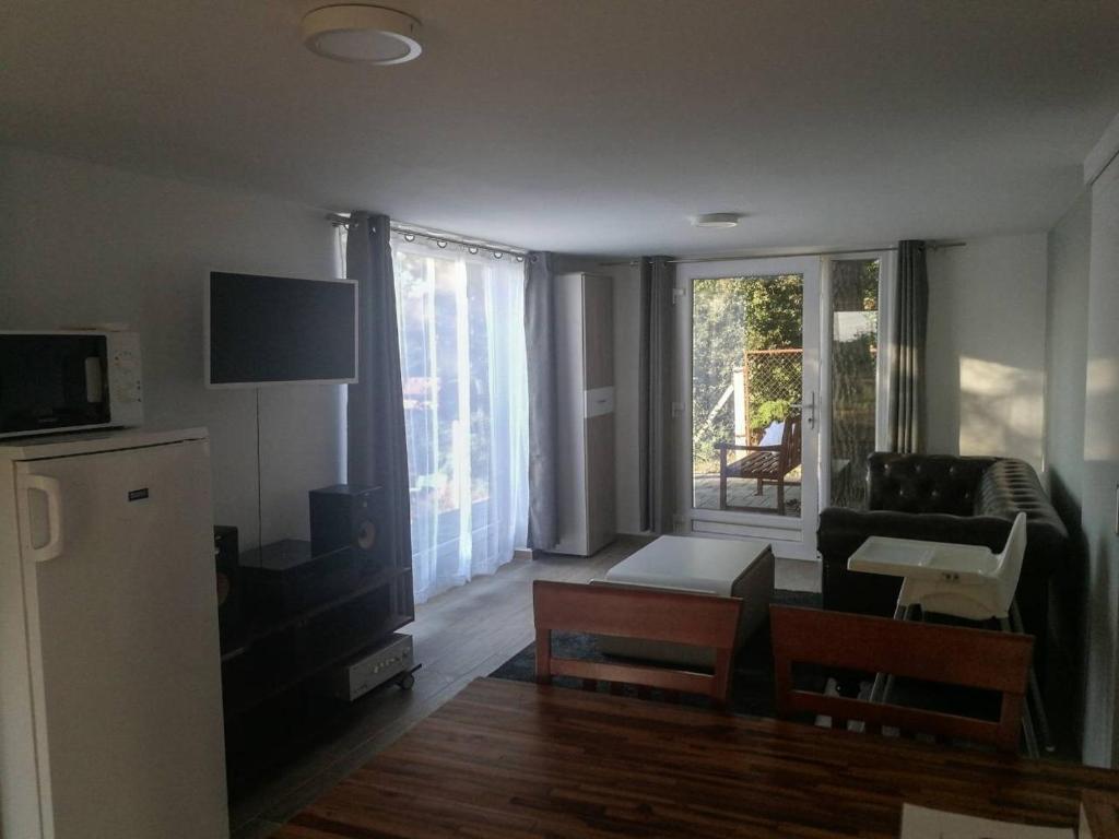TV a/nebo společenská místnost v ubytování Hilltop Apartments