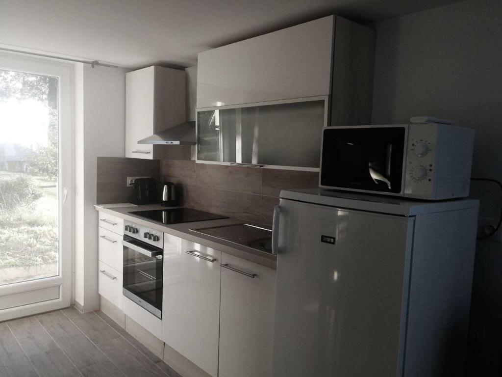 Kuchyň nebo kuchyňský kout v ubytování Hilltop Apartments