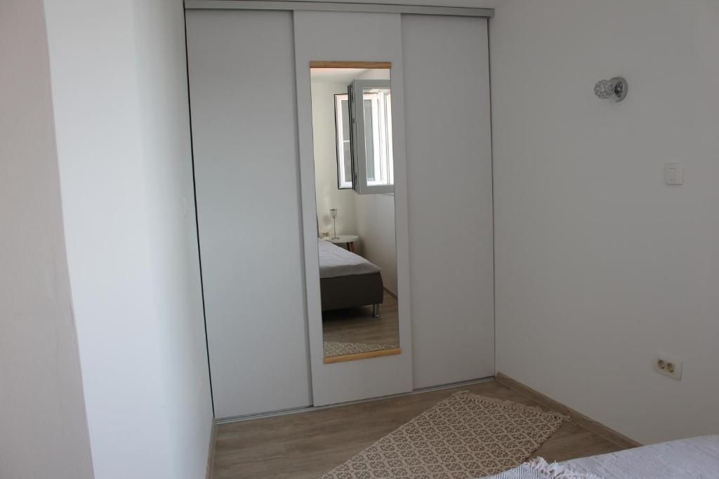 Posteľ alebo postele v izbe v ubytovaní Apartments Platana
