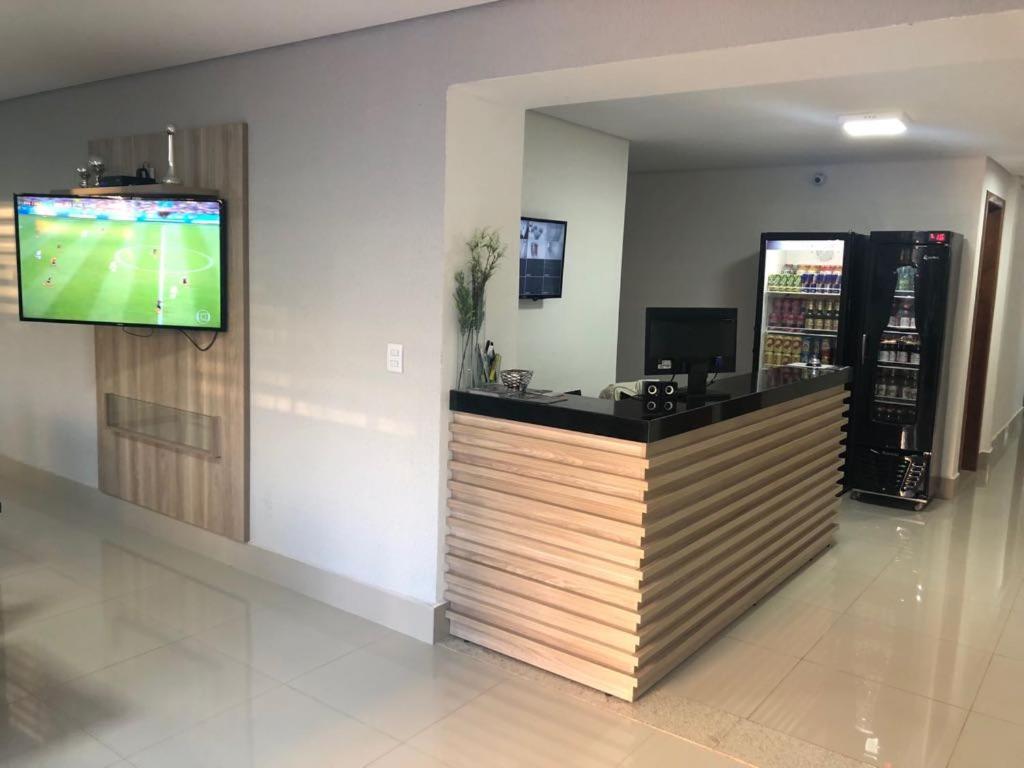 TV a/nebo společenská místnost v ubytování New Concept Hotel