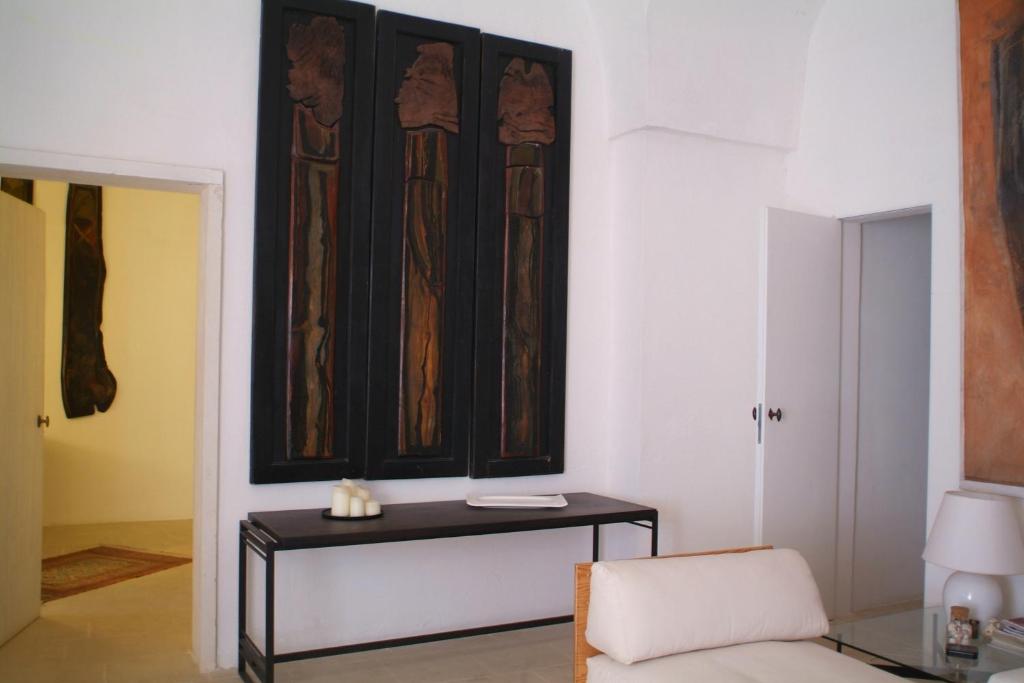 A bed or beds in a room at Masseria Frassaniti