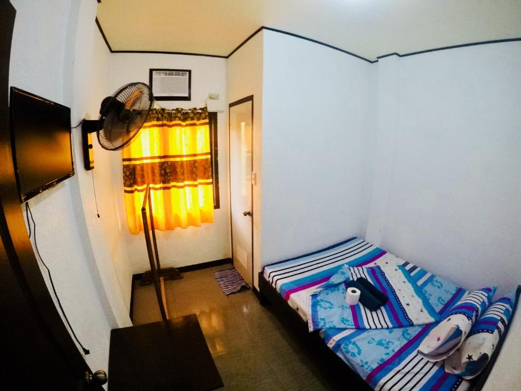 Postel nebo postele na pokoji v ubytování Ahras Place