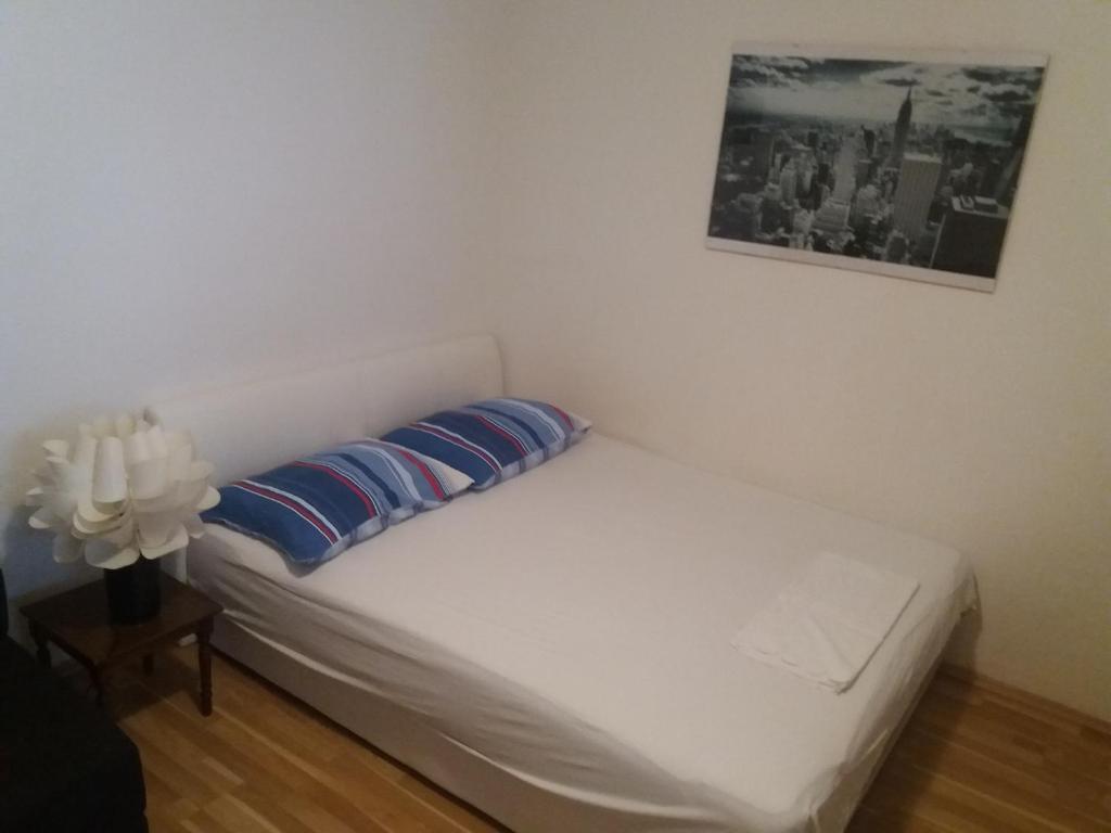 Postel nebo postele na pokoji v ubytování Studio Apartment Ema