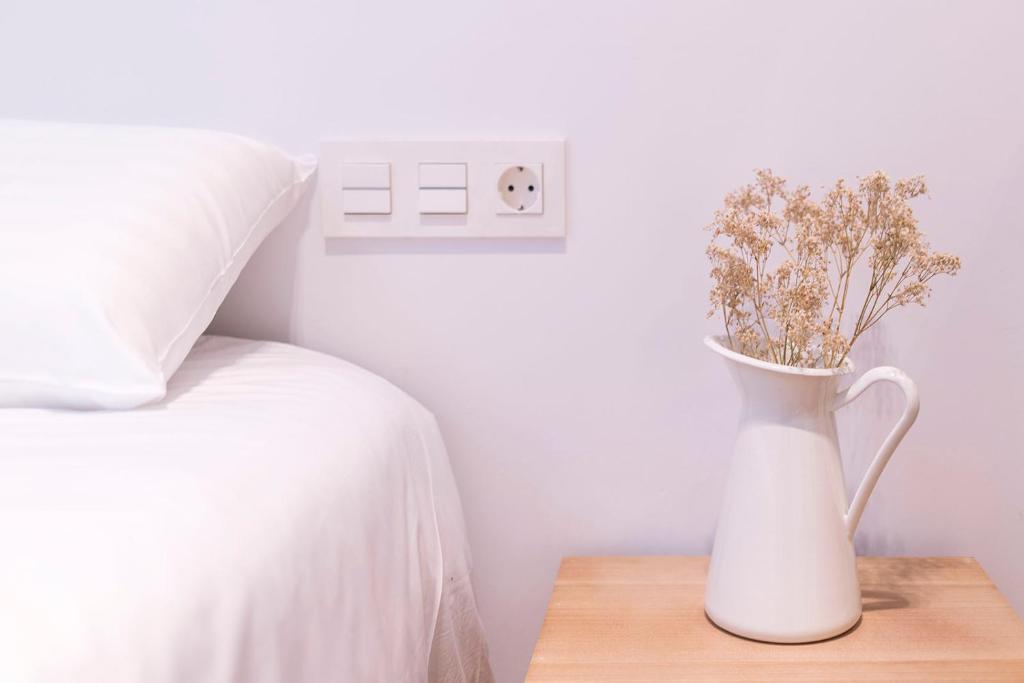 Postel nebo postele na pokoji v ubytování GETARIA APARTAMENTUAK - Sahatsaga