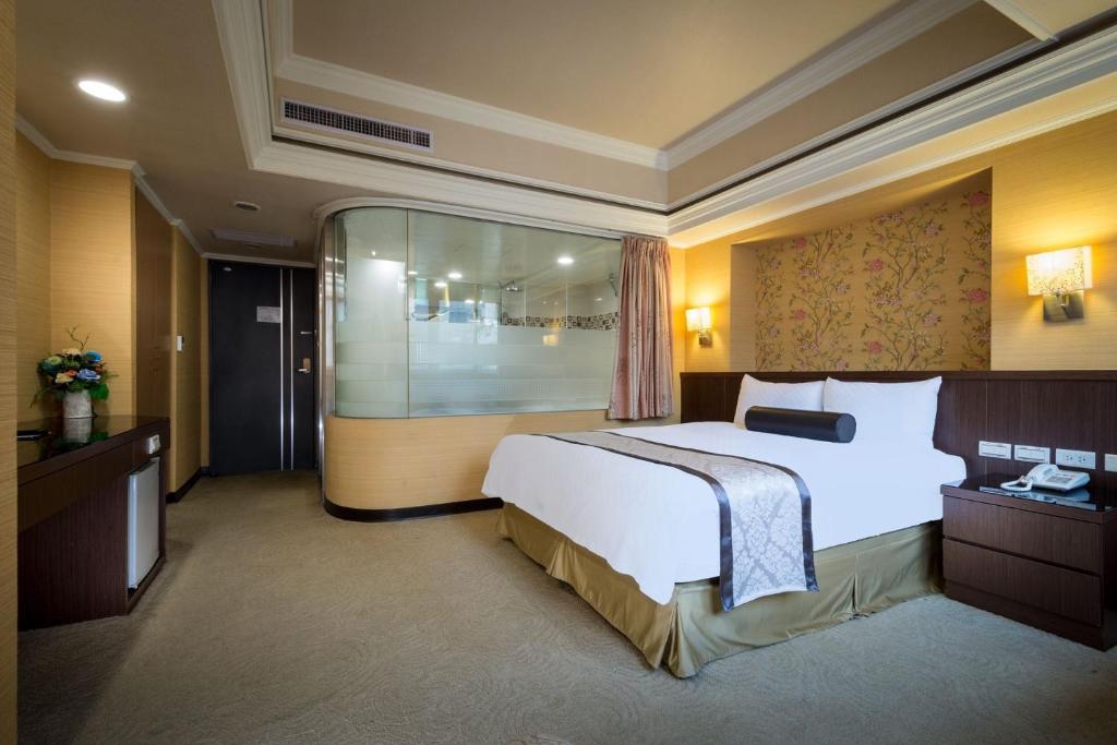 Postel nebo postele na pokoji v ubytování Good Life Hotel - Shang Hwa
