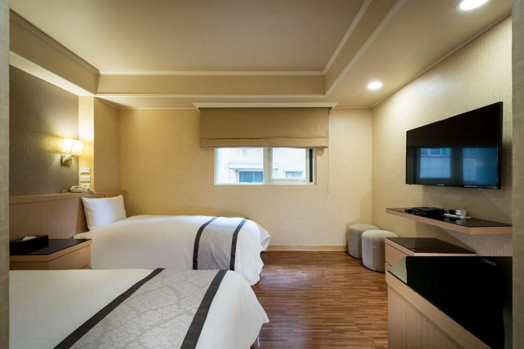 TV a/nebo společenská místnost v ubytování Good Life Hotel - Shang Hwa