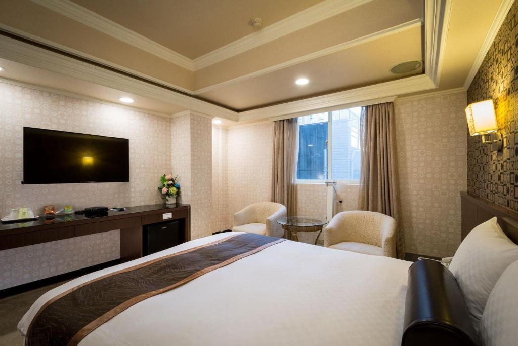 TV a/nebo společenská místnost v ubytování Good Life Hotel - Shang Hwa