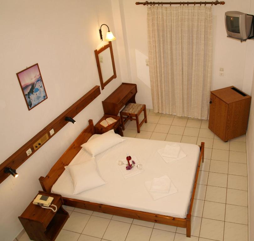 Postel nebo postele na pokoji v ubytování Levante Beach Hotel