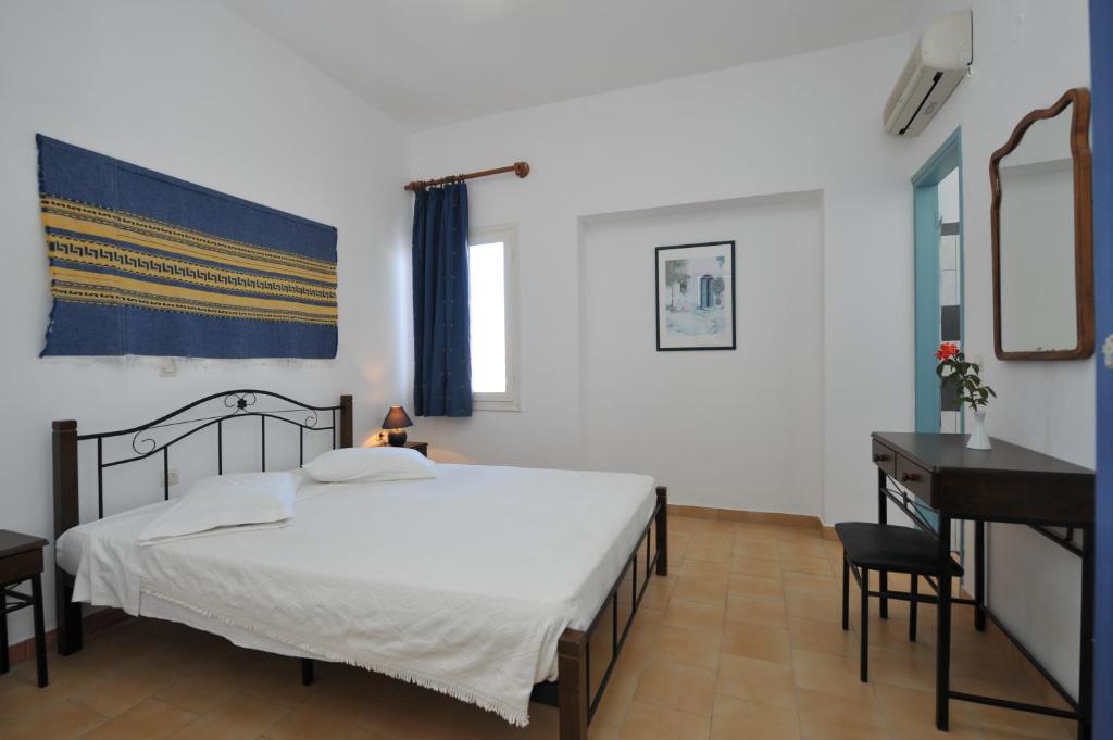 Postel nebo postele na pokoji v ubytování Eri Hotel