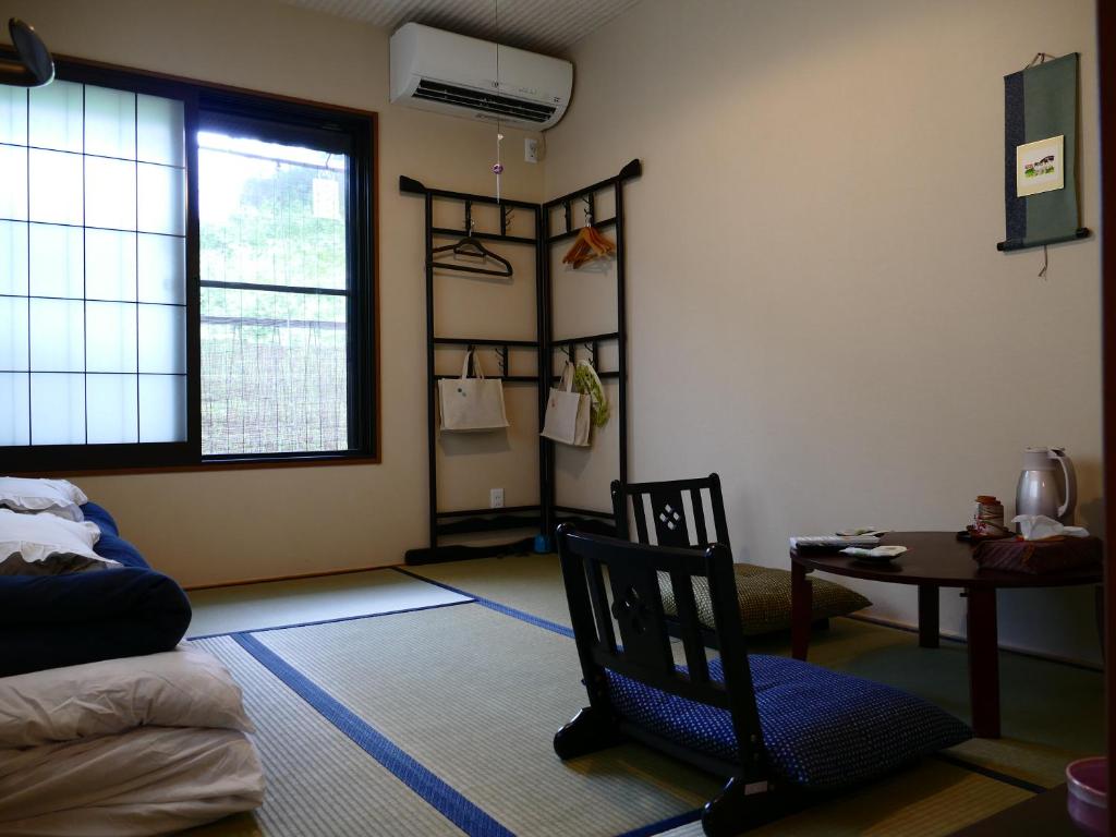 Postel nebo postele na pokoji v ubytování Guesthouse Engawa