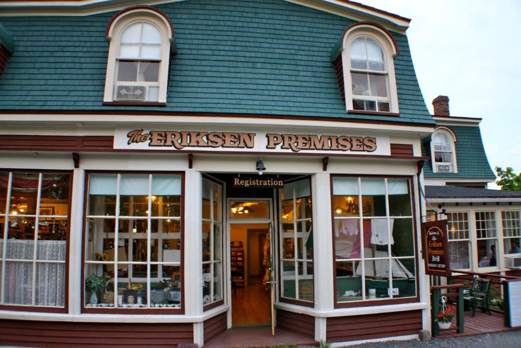 a building with a sign that reads embassy premises at Eriksen Premises in Trinity