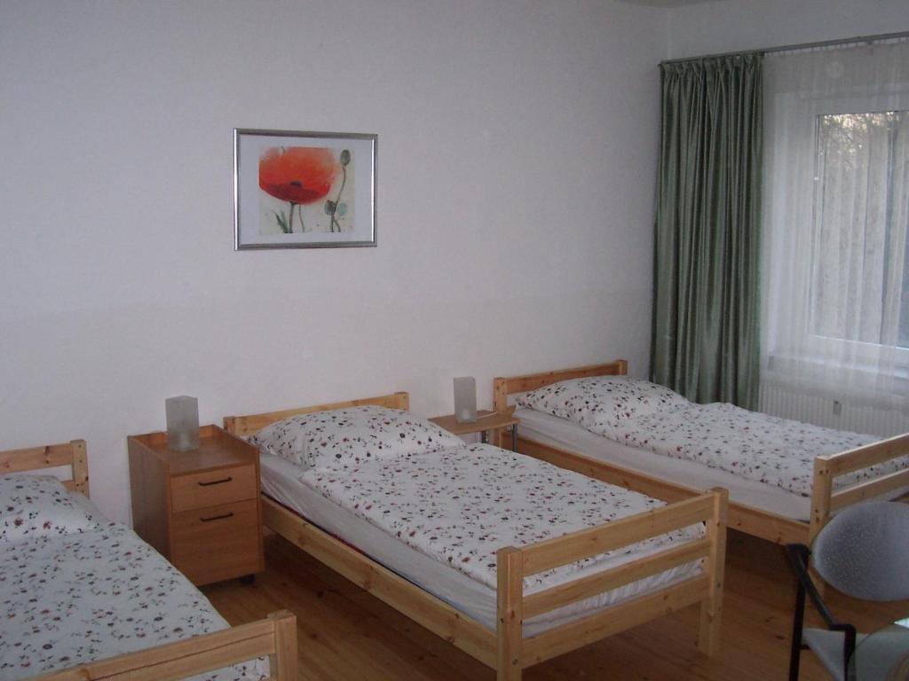 Postel nebo postele na pokoji v ubytování Apartmenthaus Hartl