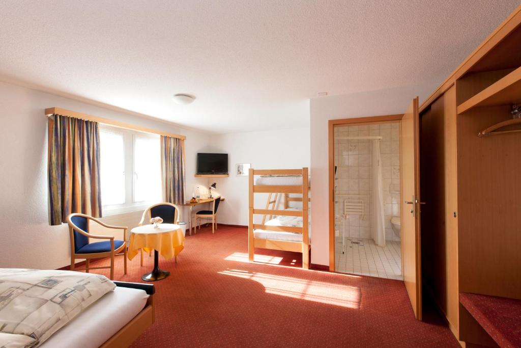 Postel nebo postele na pokoji v ubytování Hotel Arkanum