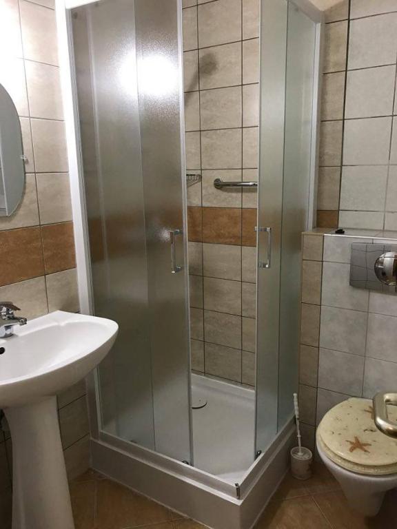 Koupelna v ubytování St. Hubertus Étterem és Panzió