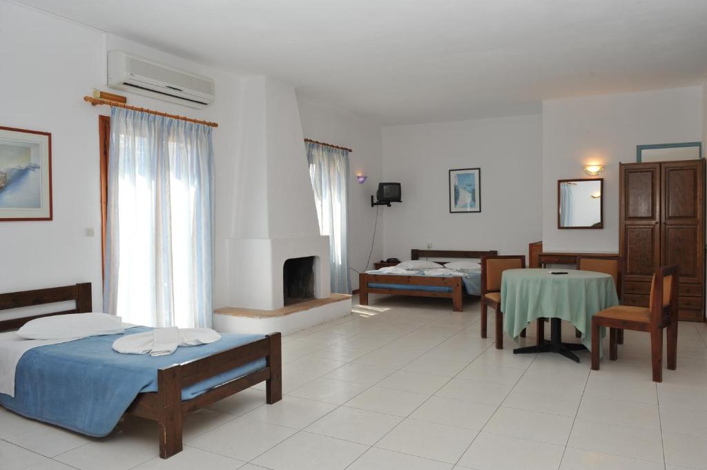 Postel nebo postele na pokoji v ubytování Eri Hotel