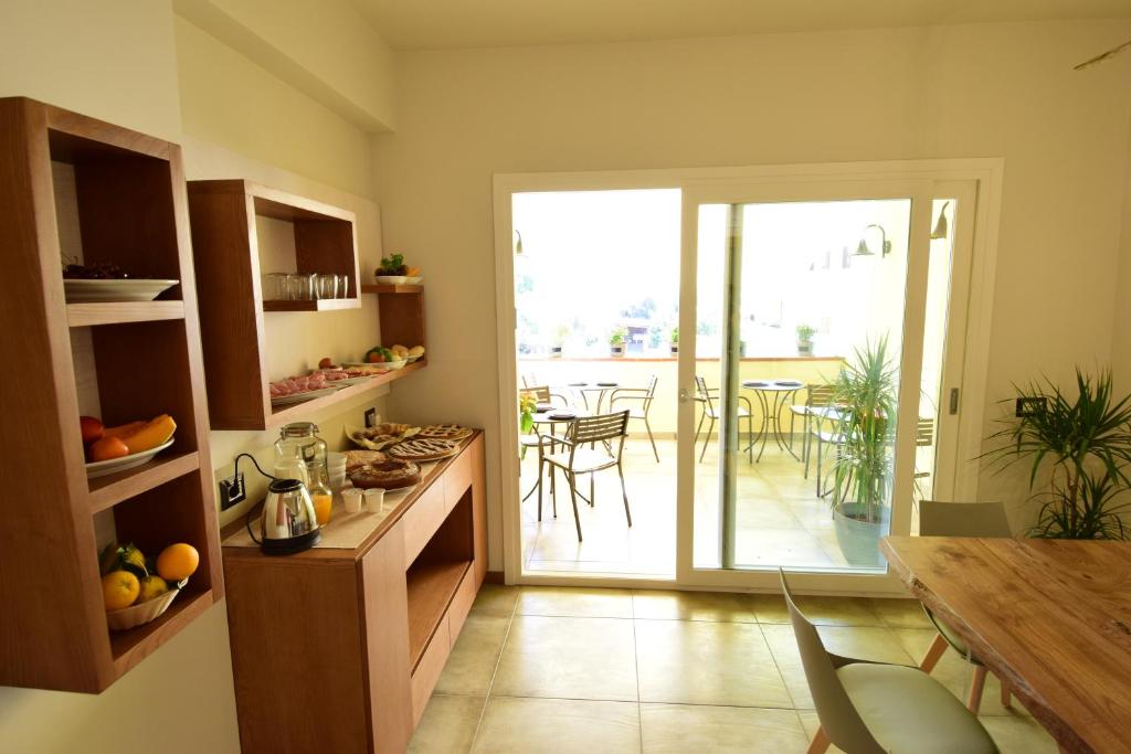 Kuchyň nebo kuchyňský kout v ubytování B&B Maestrale