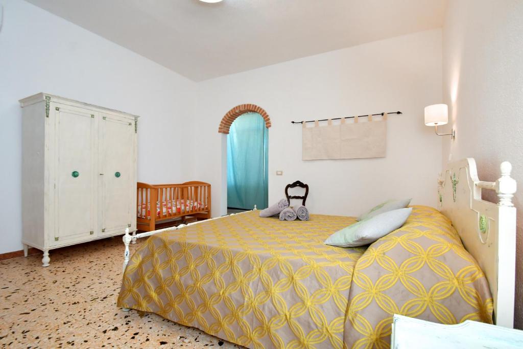 Postel nebo postele na pokoji v ubytování B&B Sa domo de sos Massaios