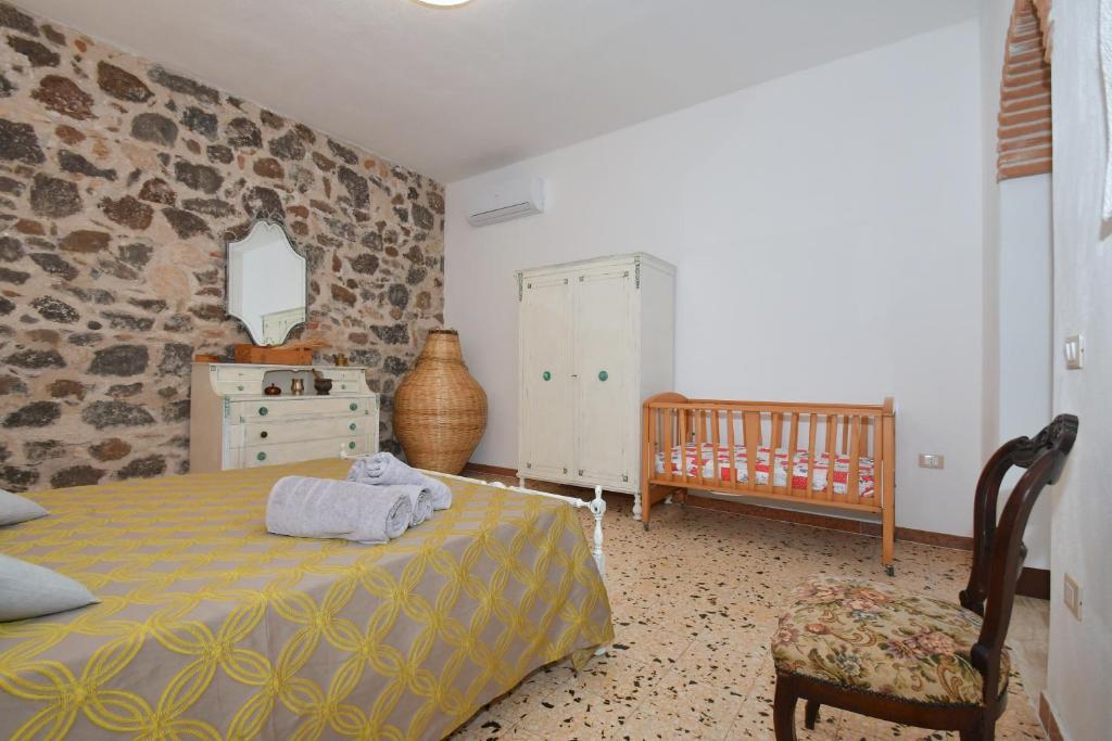 Postel nebo postele na pokoji v ubytování B&B Sa domo de sos Massaios