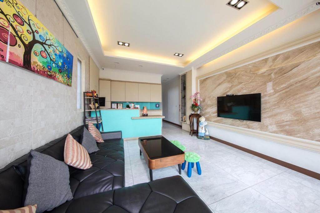 Televisyen dan/atau pusat hiburan di Tiffany Homestay