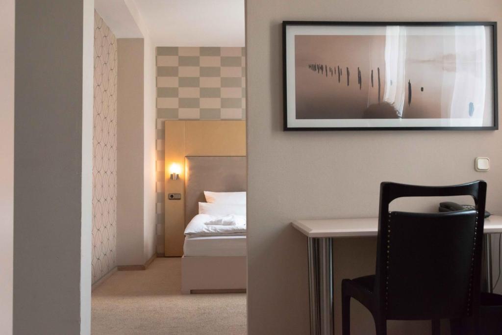 Ein Bett oder Betten in einem Zimmer der Unterkunft Hotel Engel