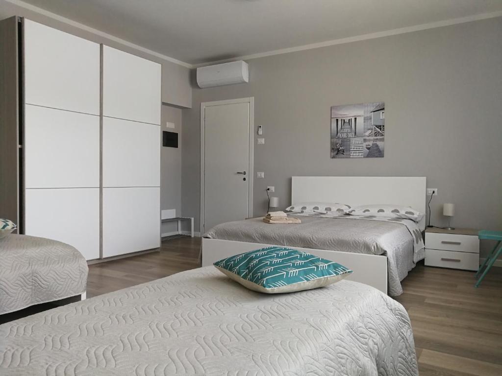 Кровать или кровати в номере Il Giardino di Sara