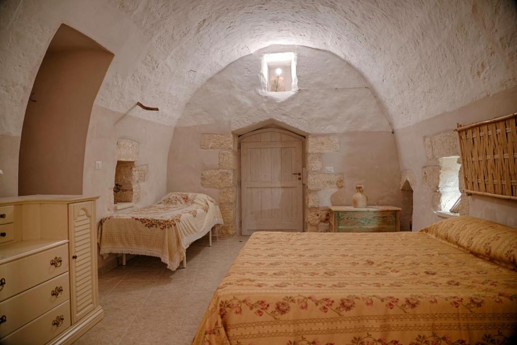 Postel nebo postele na pokoji v ubytování Lucapannune