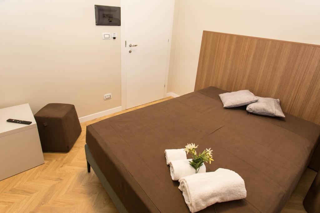 Posteľ alebo postele v izbe v ubytovaní Le Affacciate Bruzie Home Guest House