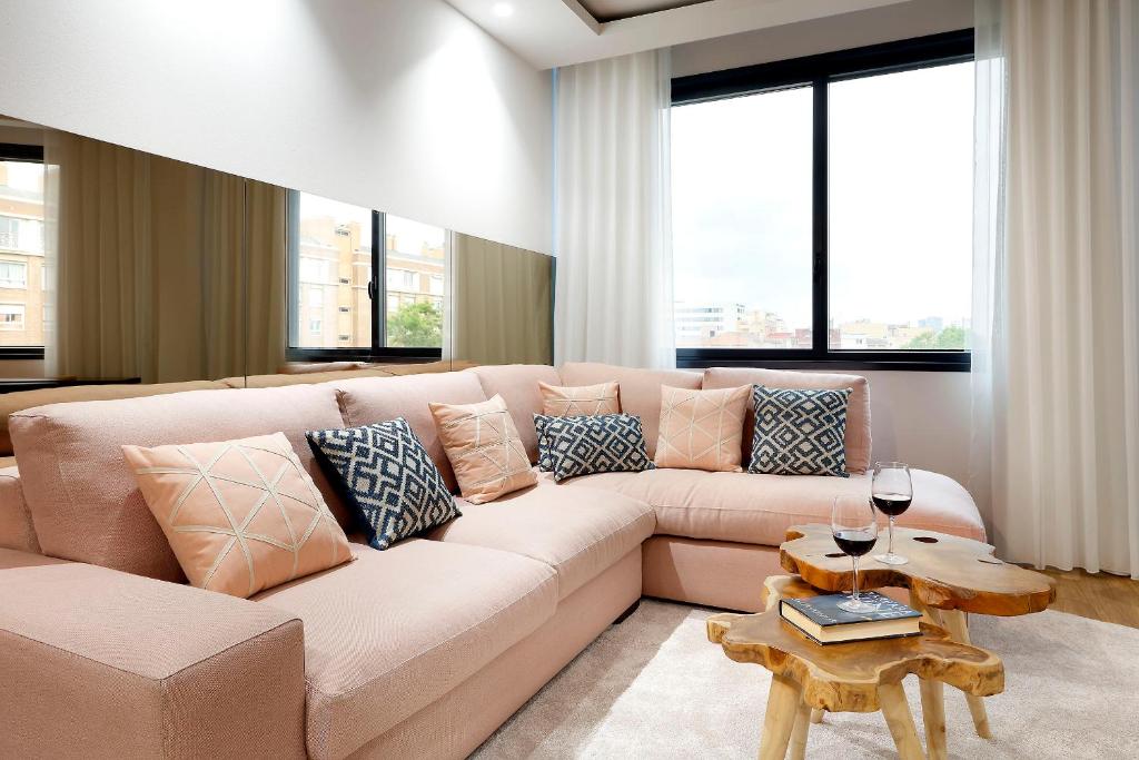 a living room with a couch and a table at Hotel SB Icaria in Barcelona