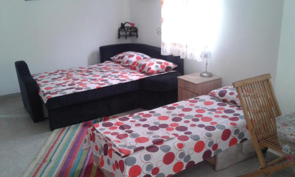 Postel nebo postele na pokoji v ubytování Danijela Apartmani
