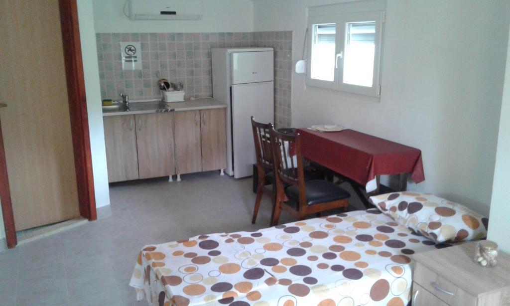 Kuchyň nebo kuchyňský kout v ubytování Danijela Apartmani