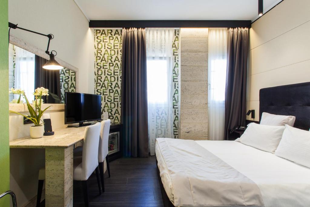 Łóżko lub łóżka w pokoju w obiekcie Egnatia Palace Hotel & Spa