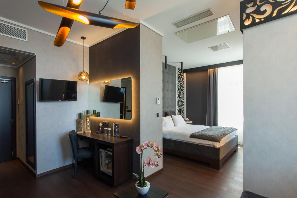 Łóżko lub łóżka w pokoju w obiekcie Egnatia Palace Hotel & Spa