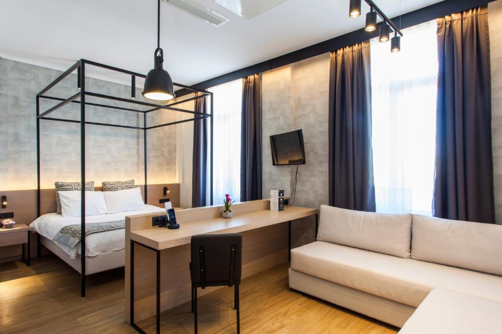 Łóżko lub łóżka w pokoju w obiekcie Egnatia Palace Hotel & Spa