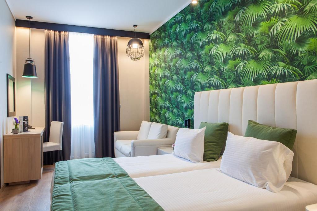 Łóżko lub łóżka w pokoju w obiekcie Egnatia Palace Hotel & Spa