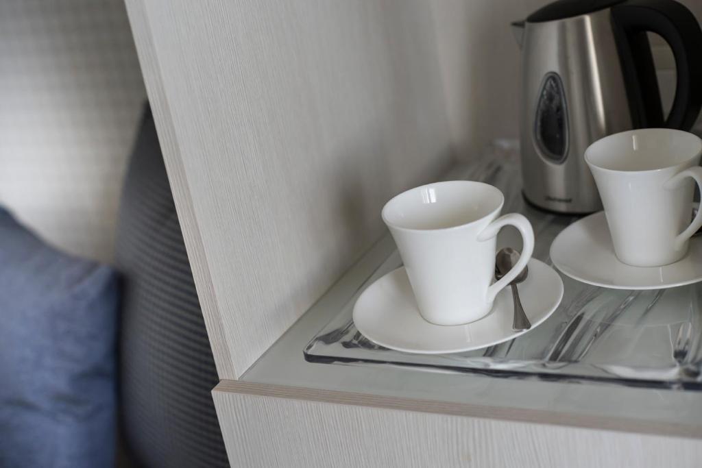 Příslušenství pro přípravu čaje a kávy v ubytování Hotel Nautico