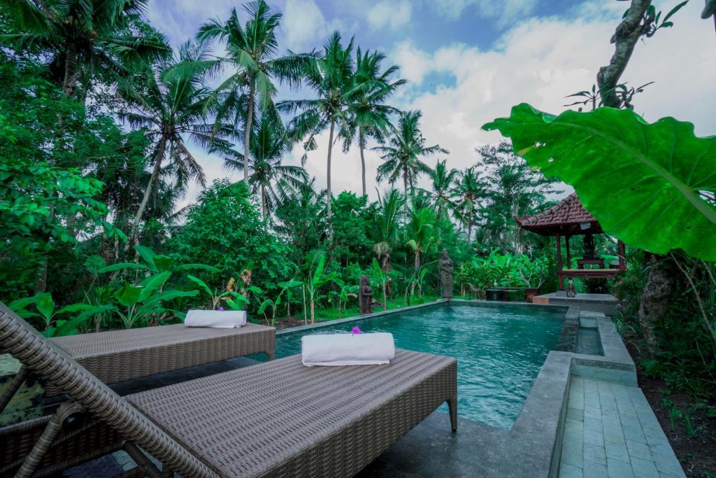 Bazén v ubytování Vinayaka Ubud nebo v jeho okolí