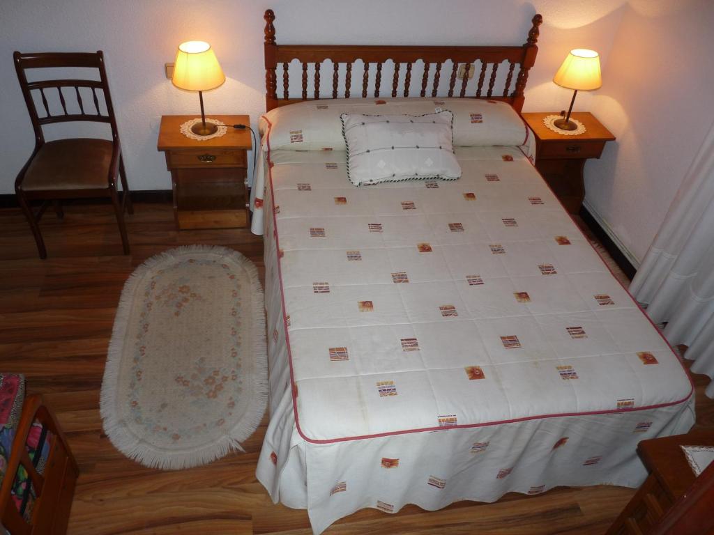 A bed or beds in a room at Hospedaje Roiz