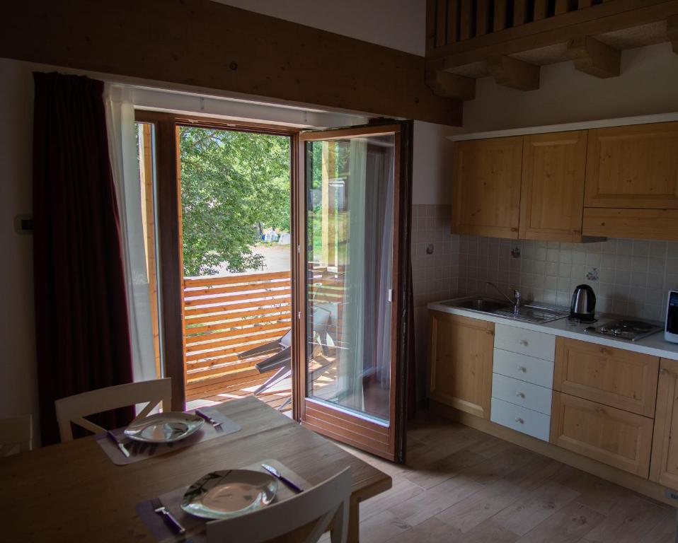 Kuchyň nebo kuchyňský kout v ubytování RTA Hotel Le Vallene