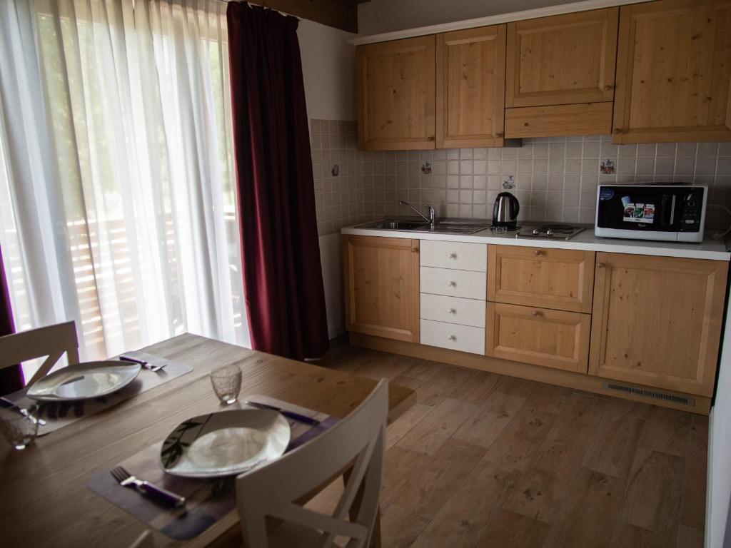 Kuchyň nebo kuchyňský kout v ubytování RTA Hotel Le Vallene