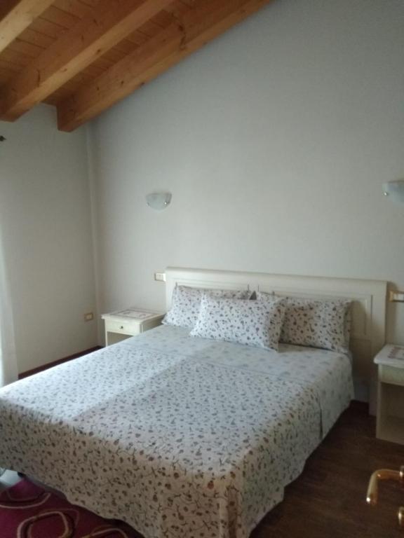 Postel nebo postele na pokoji v ubytování B&B Al Lauro