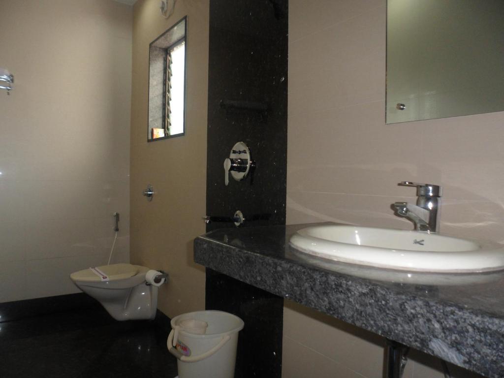 Koupelna v ubytování Hotel Esteem