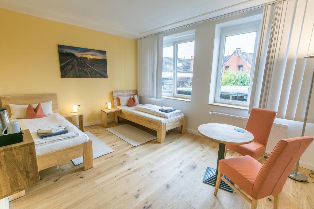 Postel nebo postele na pokoji v ubytování Hotel Johnsburg