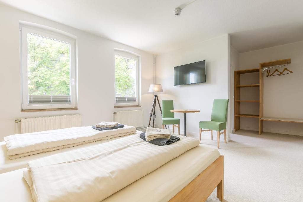 TV a/nebo společenská místnost v ubytování Hotel Johnsburg