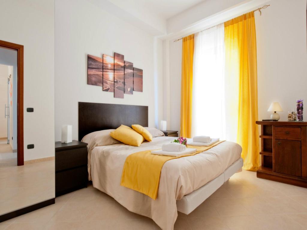 Łóżko lub łóżka w pokoju w obiekcie B&B La Casetta
