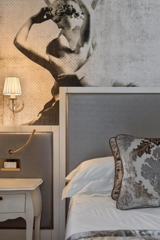 Кровать или кровати в номере Hotel Ca' D'Oro Tre Stelle Superior Adults only
