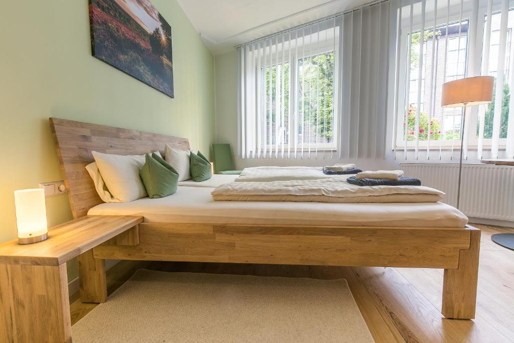 Postel nebo postele na pokoji v ubytování Hotel Johnsburg