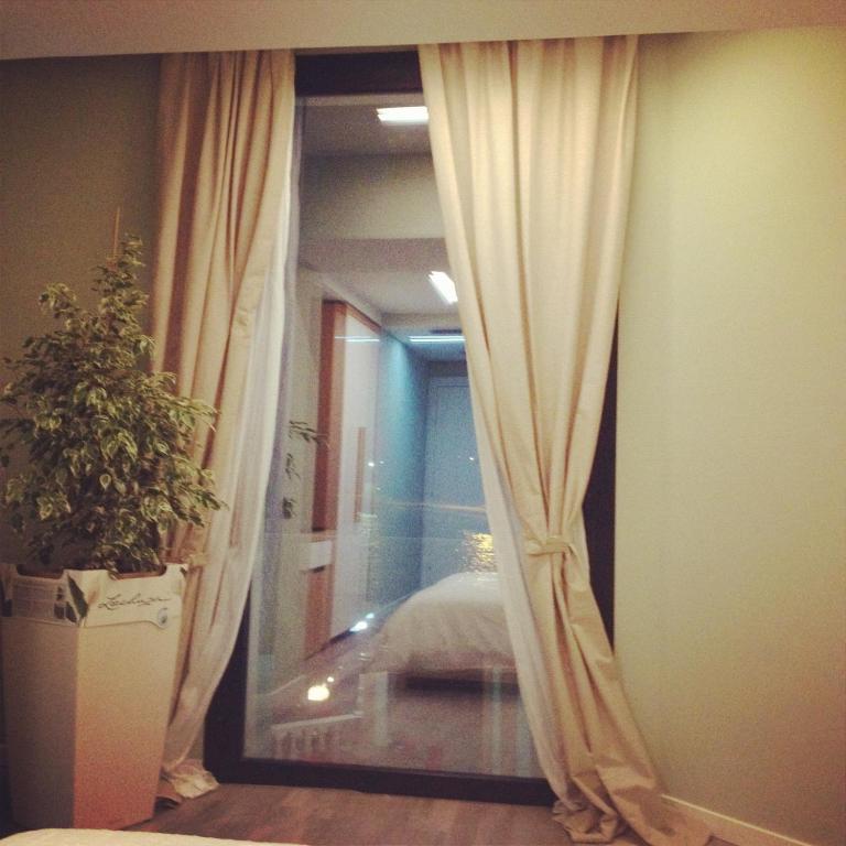 Postel nebo postele na pokoji v ubytování Hotel Bologna