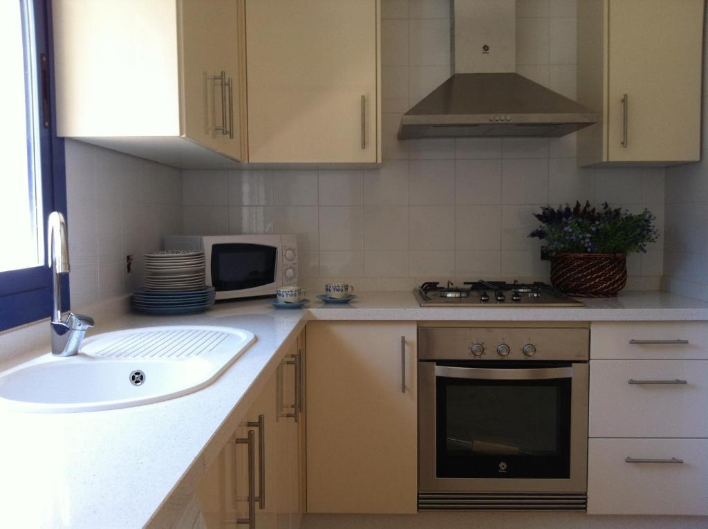 A kitchen or kitchenette at Es Lliri Blanc
