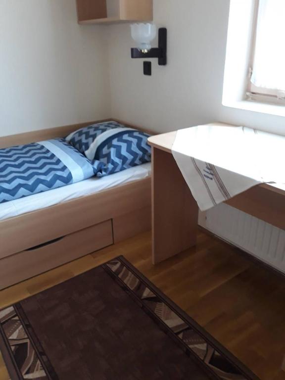 Postel nebo postele na pokoji v ubytování Ádám Vendégház